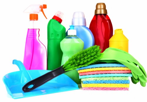 Carpet cleaner preparing a safe workspace before cleaning begins