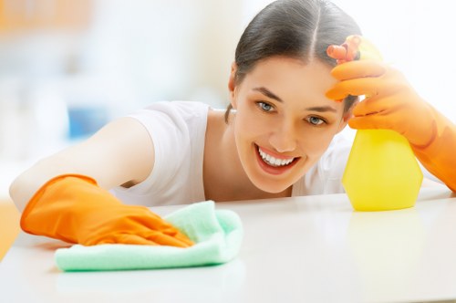 Carpet cleaning technician preparing safe equipment in Cambridge Heath